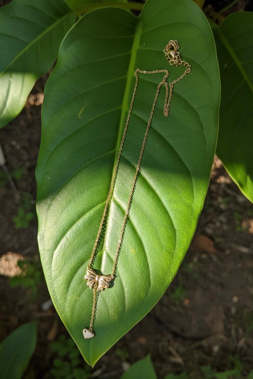 Gold Plated Stainless Steel Anti Tarnish Heart Themed Bow inspired Pendant Necklace 